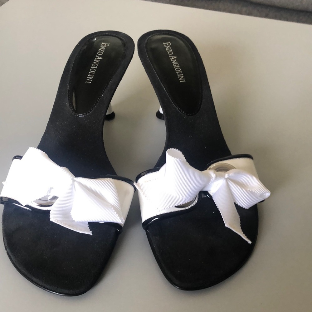 Enzo Angiolini white patent mules black trim with white ribbon bow. Size 8 1/2